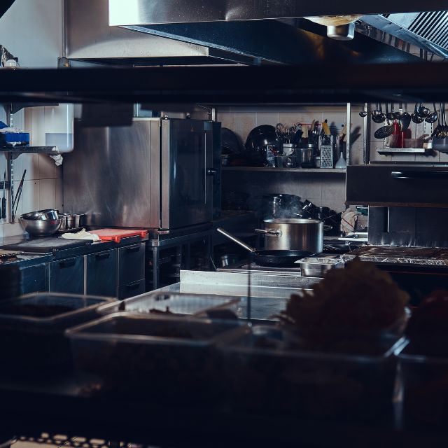 Why Commercial Restaurants Prefer Custom Stainless Steel 4 dimly lit kitchen